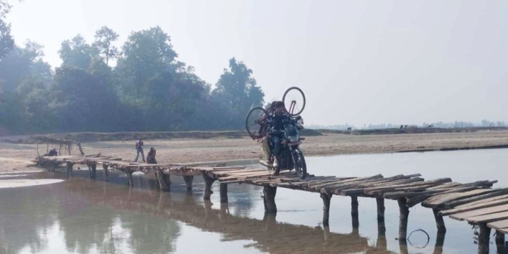 Cross the river at Lalzhadi across Kathe Bridge