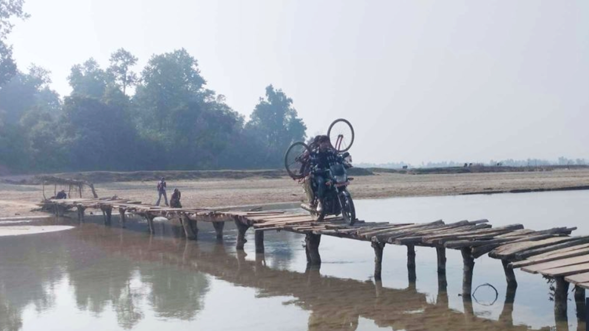 Cross the river at Lalzhadi across Kathe Bridge