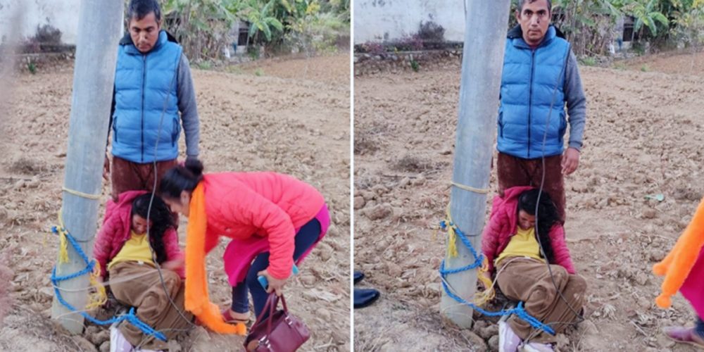 In Sindhuli, a woman was tied to a pole and beaten unconscious