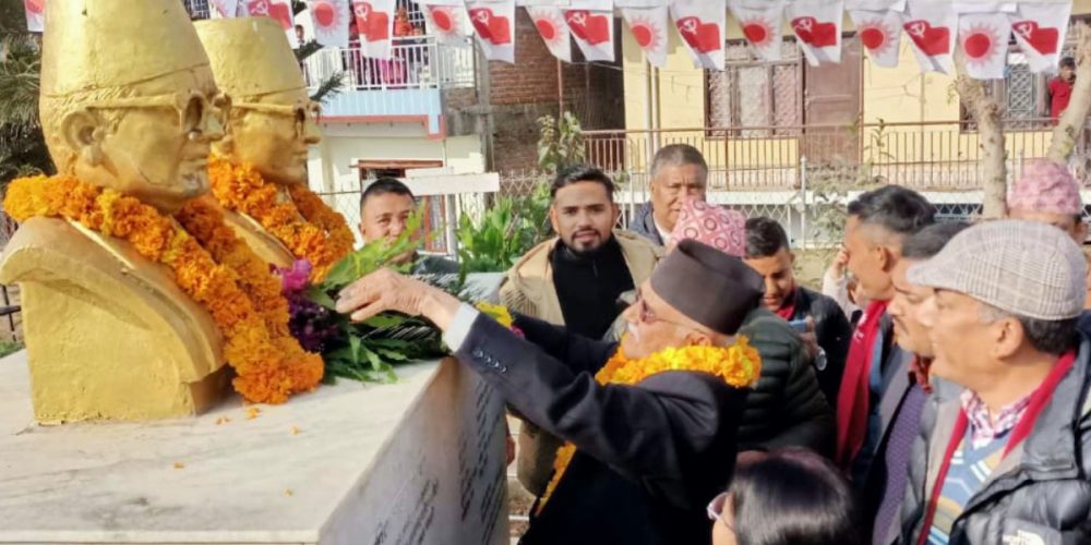 UML President Oli laying wreath on Madan Ashrit's salik