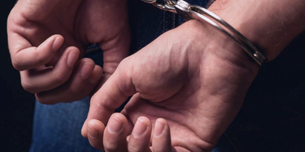 A prisoner who absconded with handcuffs from the district court was caught