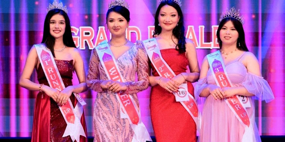 The crown of Miss Ecollege 2024 is on the head of Arju Paudel